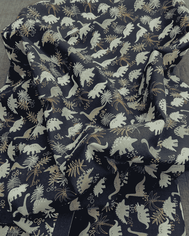 tissu coton motif dinosaure bleu marine