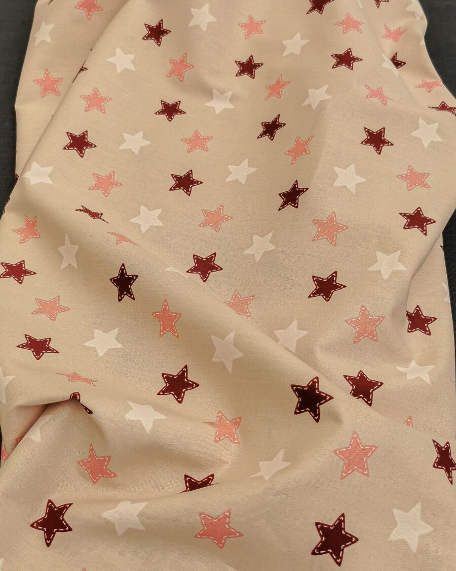 tissu coton grande étoile rose poudré