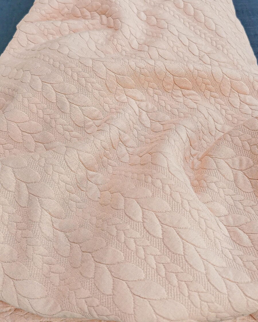 tissu jersey torsadé ton rose poudré