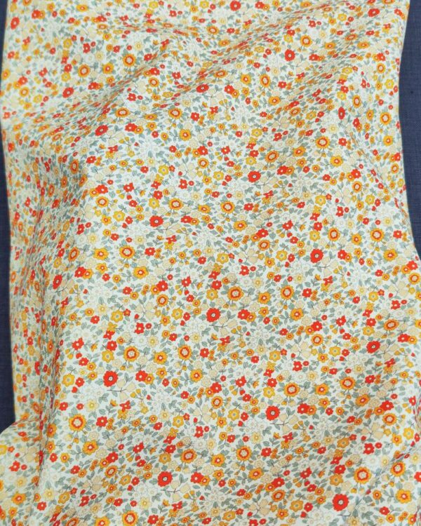 tissu coton bio fleuri rouge et jaune orangé