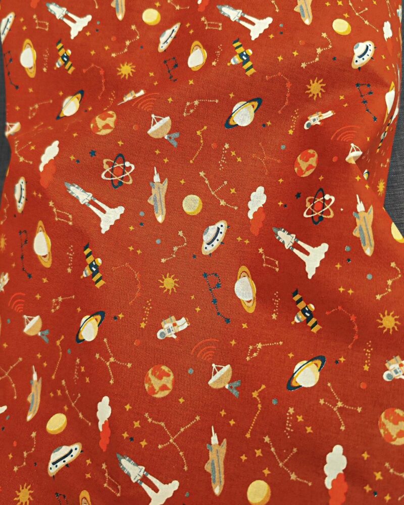 tissu coton astres planète et astronaute terracotta