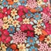 tissu coton enduit fleuri fuchsia orange camel fond chocolat