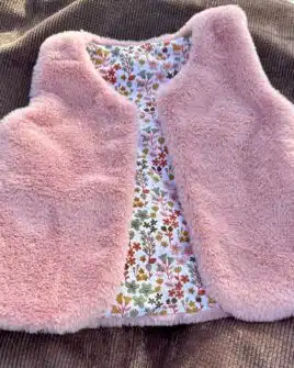 gilet de berger fausse fourrure poil court rose poudré