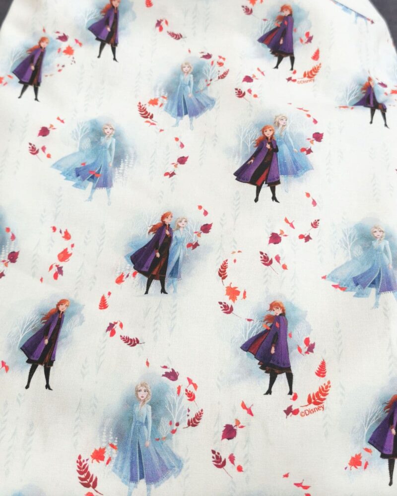tissu coton licence la reine des neiges Anna et Elsa