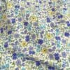 tissu jersey style liberty fleur camaïeu de bleu et jaune