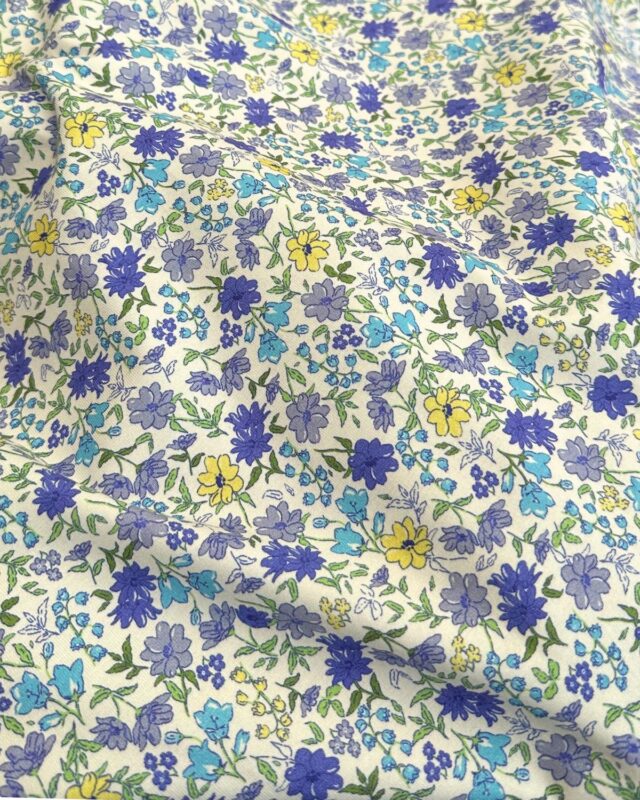 tissu jersey style liberty fleur camaïeu de bleu et jaune