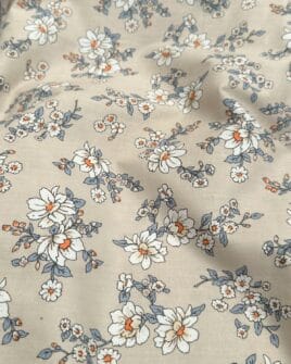 tissu popeline de coton motif marguerite fond taupe