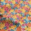 tissu coton fleuri multicolore fuchsia bleu jaune