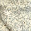 tissu double gaze colombe et fleuri bleu fond sable