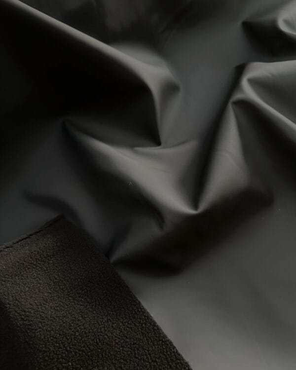 tissu polaire imperméable uni noir réversible