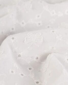 tissu broderie anglaise papillon brodé blanc
