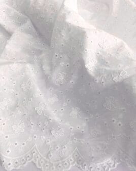 tissu broderie anglaise papillon brodé blanc