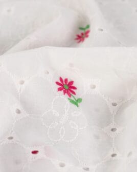 tissu broderie anglaise petite fleur fuchsia fond blanc