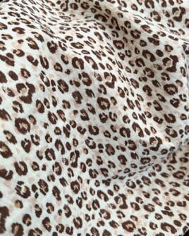 tissu double gaze imprimé léopard blanc